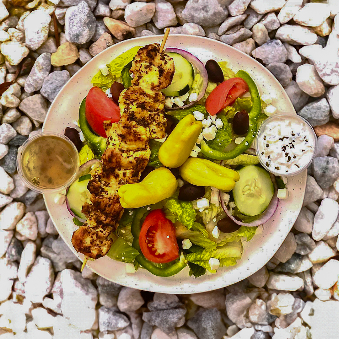 greek_food_special_platter_stones_background